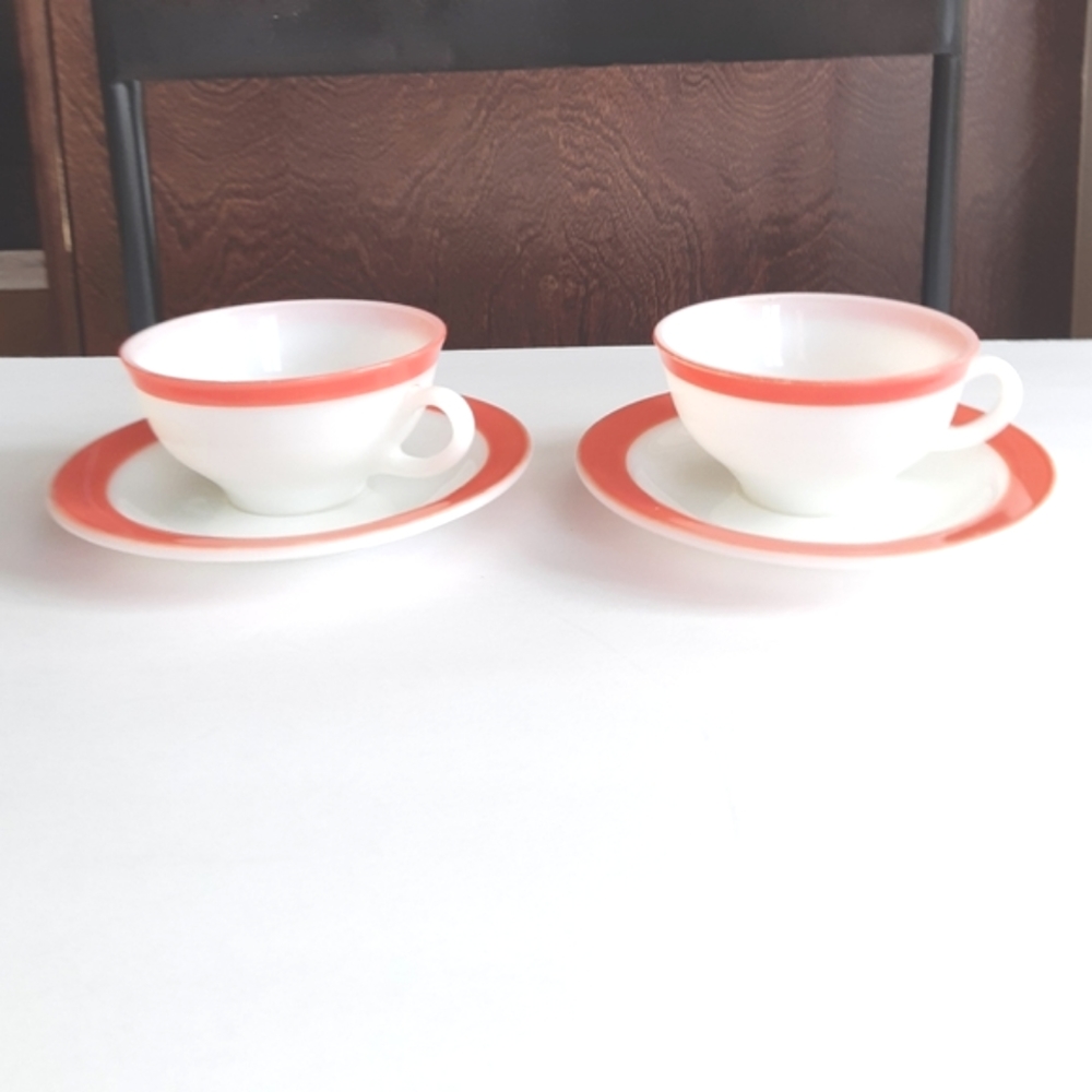 2 Pyrex pink cup and saucer sets